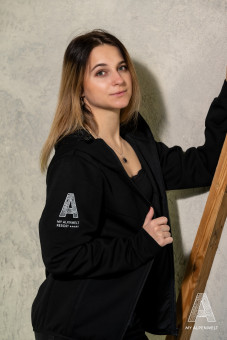 Alpenwelt Resort logo on the right sleeve