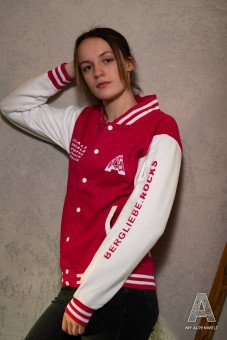 Pink and white college jacket: Alpenwelt logo on the front left, Bergliebe.Rocks lettering on the left sleeve